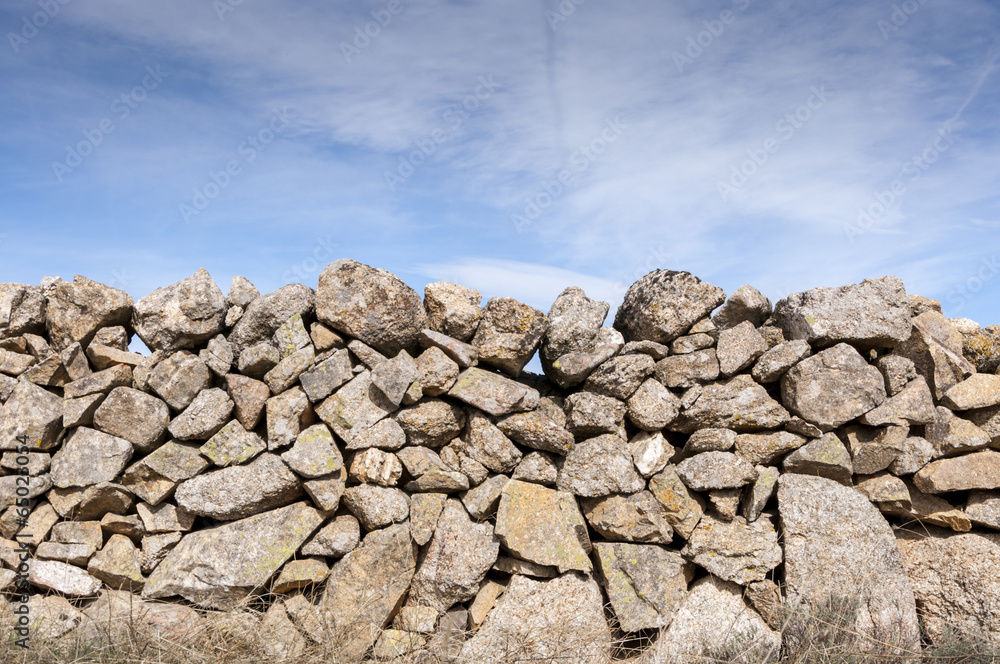 Old stone wall in the ranch Old stone wall in the ranch