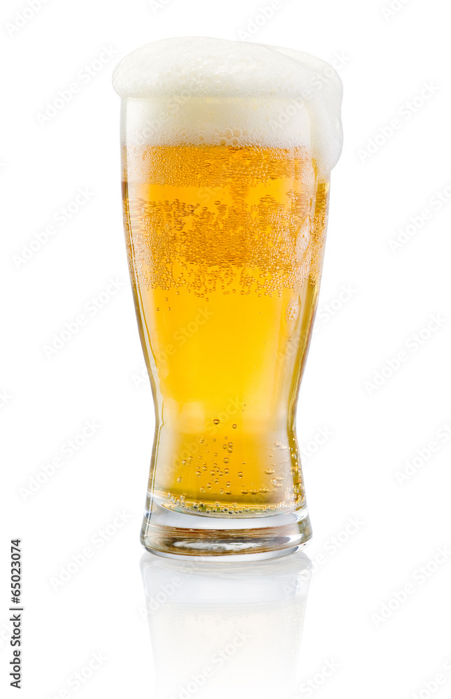 Glass of fresh beer with cap of foam isolated on white backgroun Glass of fresh beer with cap of foam isolated on white backgroun