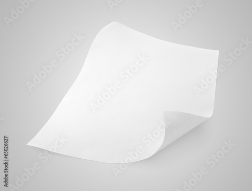 Blank sheet of white paper on gray