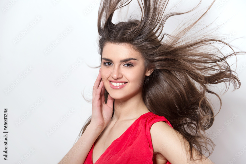 beautiful brunette looking at camera and smiling. beautiful brunette looking at camera and smiling.