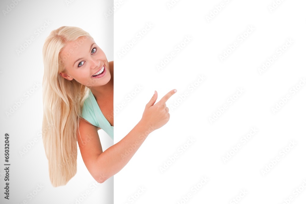 Composite image of pretty blonde showing card Composite image of pretty blonde showing card