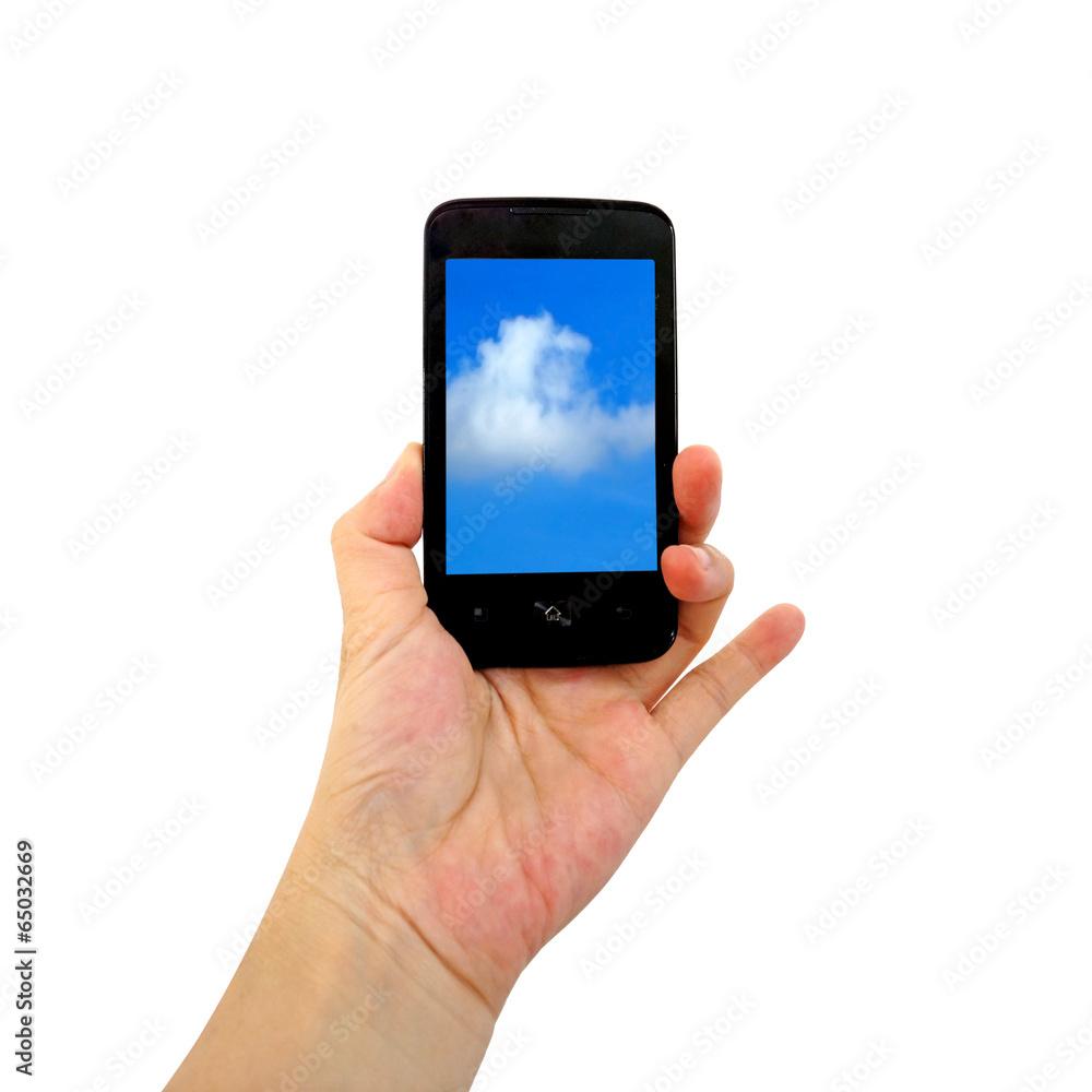 Mobile phone in the hand with blue sky isolated on white