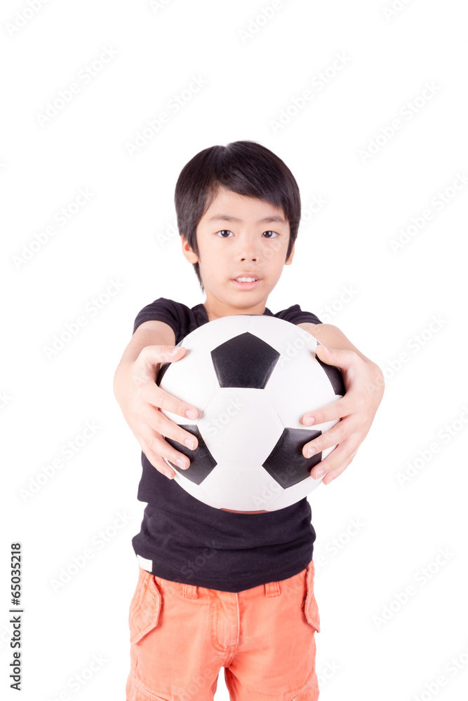 Cute boy is holding a football ball isolated on a white backgrou