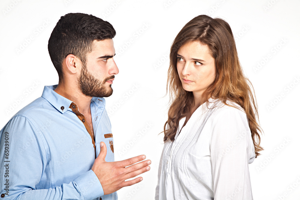 Young mixed-race couple having ralationship problems isolated on Young mixed-race couple having ralationship problems isolated on