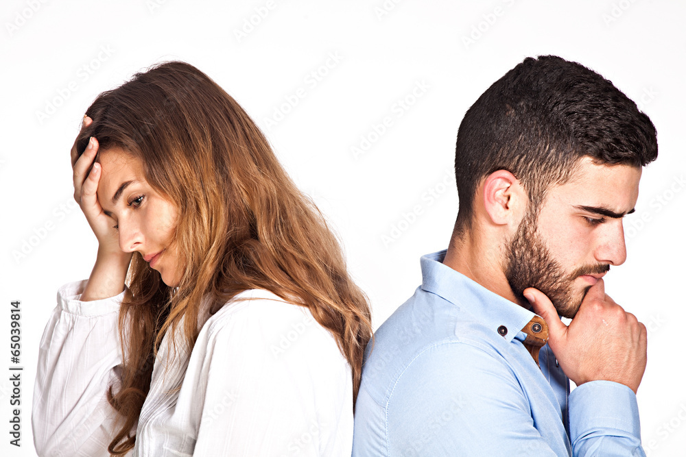 Young mixed-race couple having ralationship problems isolated on Young mixed-race couple having ralationship problems isolated on