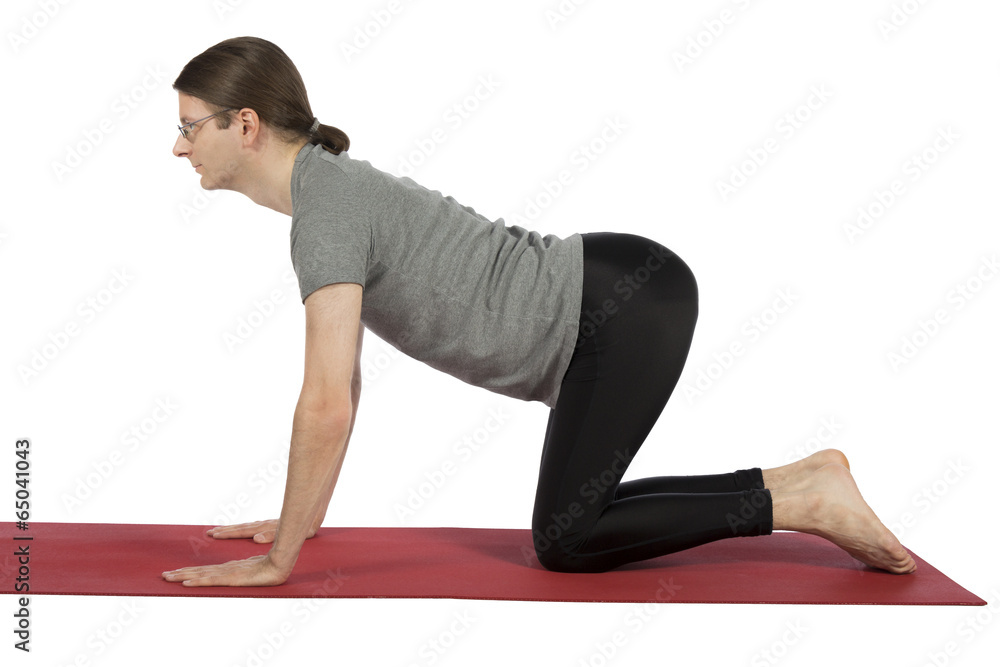 Man doing cow pose Man doing cow pose
