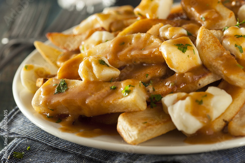 Unhealthy Delicious Poutine with French Fries photo