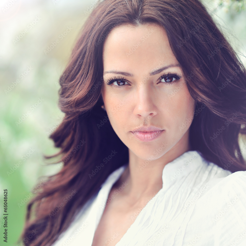 Beautiful young woman face closeup - perfect skin Beautiful young woman face closeup - perfect skin