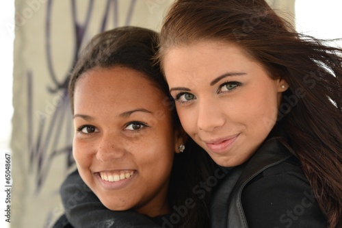 Portrait of two women laughing