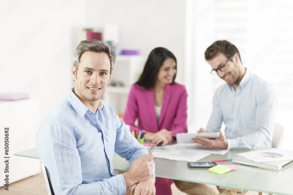 Portrait of a smiling senior businessman in meeting Portrait of a smiling senior businessman in meeting
