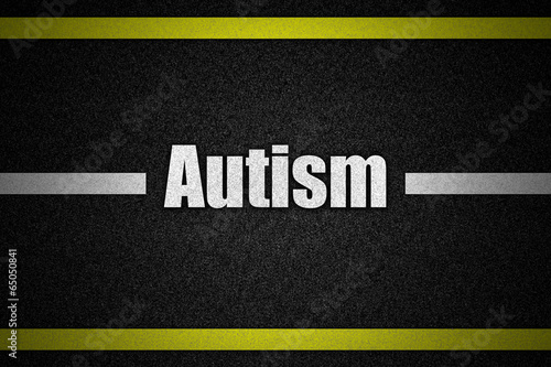 Traffic  road surface with text Autism photo