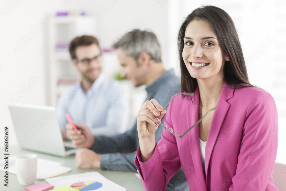 Portrait of a smiling businesswoman in meeting Portrait of a smiling businesswoman in meeting