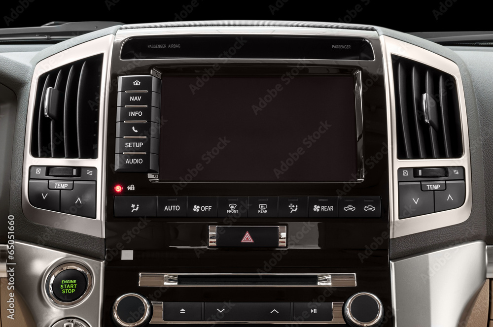Fototapeta premium Panel of a modern car. Screen multimedia system.