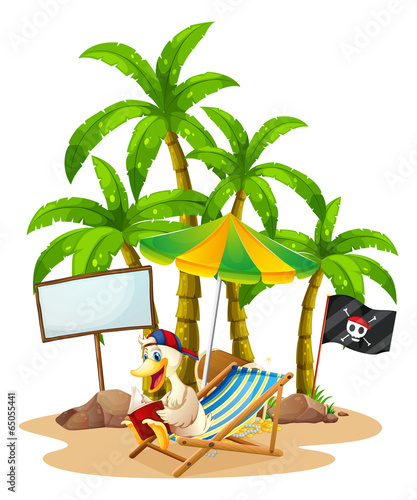 A duck relaxing at the beach near the empty signboard