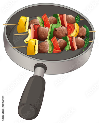 A pan with foods on stick