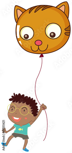 A boy holding a cat balloon
