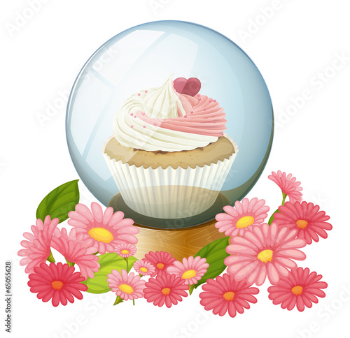 A cupcake inside the transparent ball