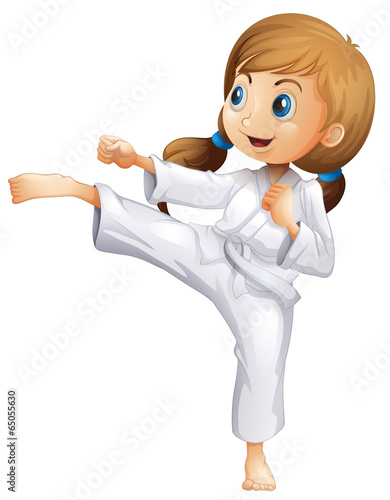 An energetic young woman doing karate