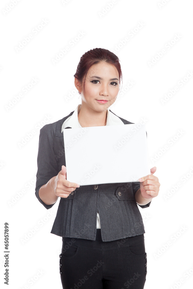 Asian businesswoman show a blank sign and smile Asian businesswoman show a blank sign and smile