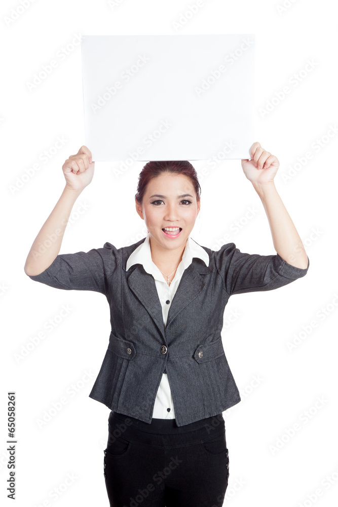 Asian businesswoman happy show a blank sign over head Asian businesswoman happy show a blank sign over head
