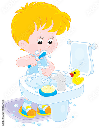 Child brushing his teeth