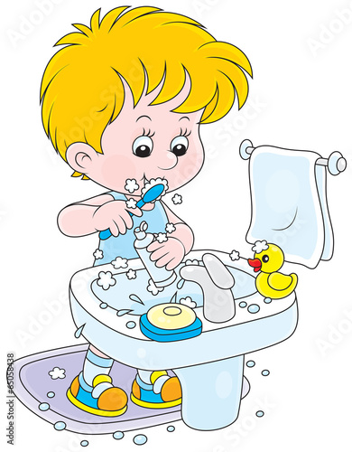 Little boy cleaning his teeth
