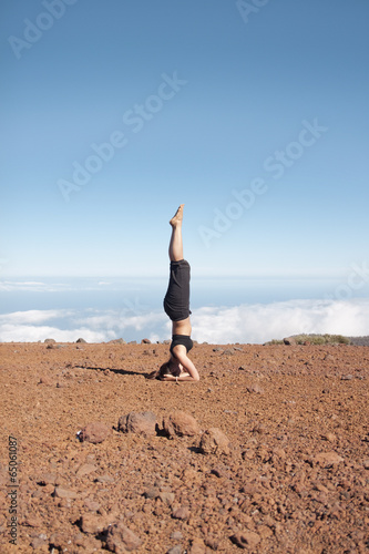 Young woman doing yoga in the nature
