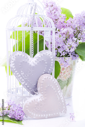 Beautiful decoration with bouquet of flowers and hearts