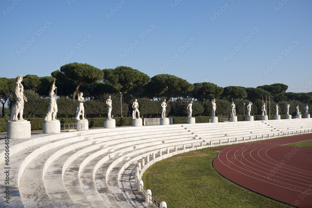 Obraz premium Marble statues in the Stadio dei Marmi, Rome Italy.