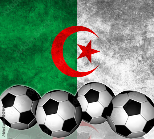Fototapeta Naklejka Na Ścianę i Meble -  Footballs on top of flag - Algeria