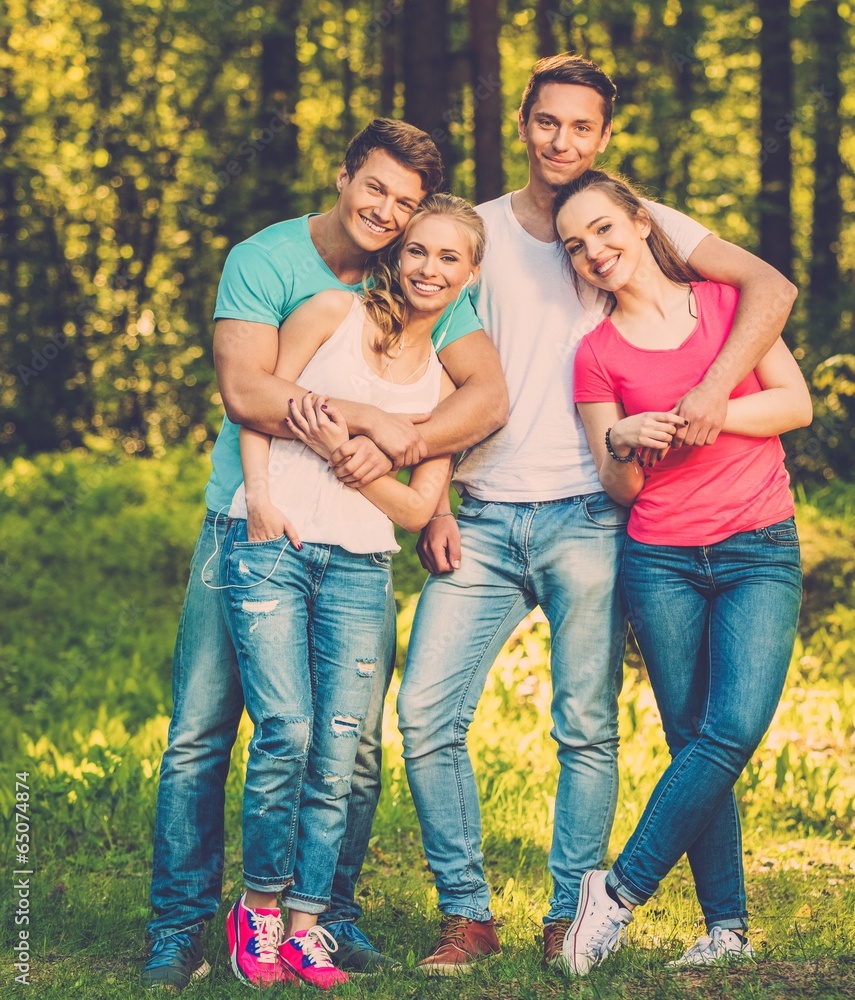 Fototapeta premium Group of happy friends outdoors on sunny day