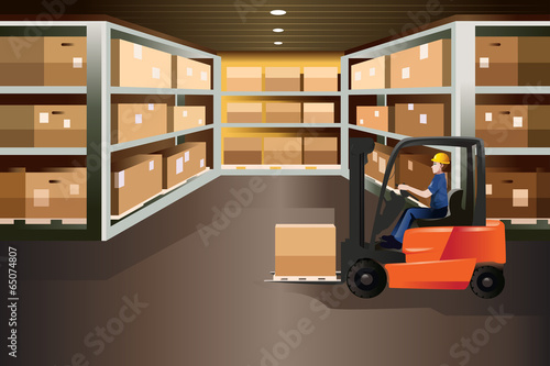 Worker driving a forklift