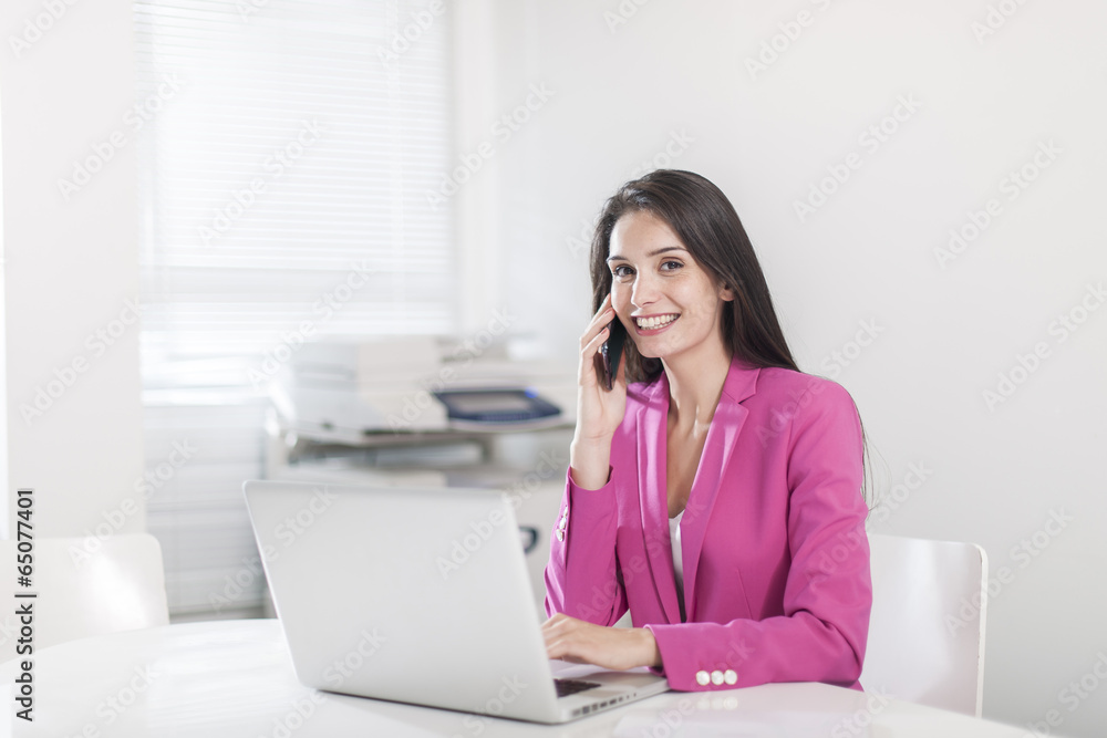 beautiful businesswoman at office in front her laptop beautiful businesswoman at office in front her laptop