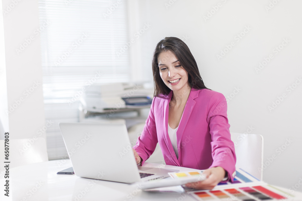 beautiful businesswoman at office in front her laptop beautiful businesswoman at office in front her laptop