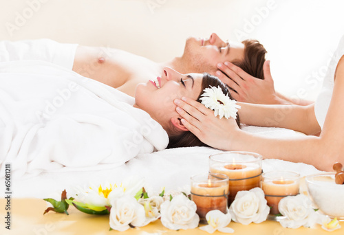 Couple Receiving Head Massage