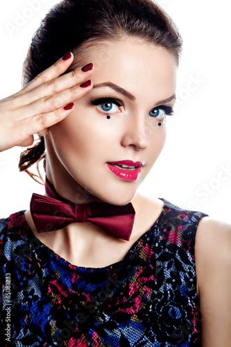 Beautiful woman with red bow-tie
