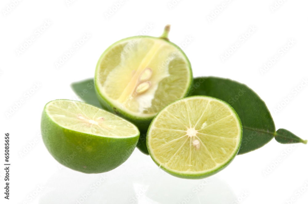 Slice limes on white background isolation Slice limes on white background isolation