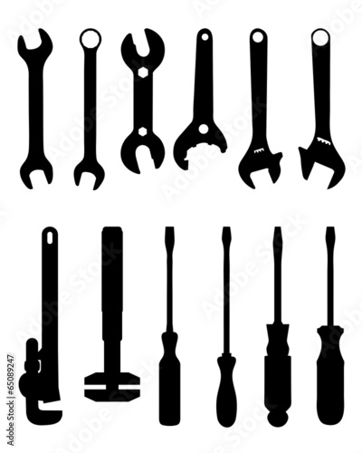 Black silhouettes of screwdriver and screw wrench, vector