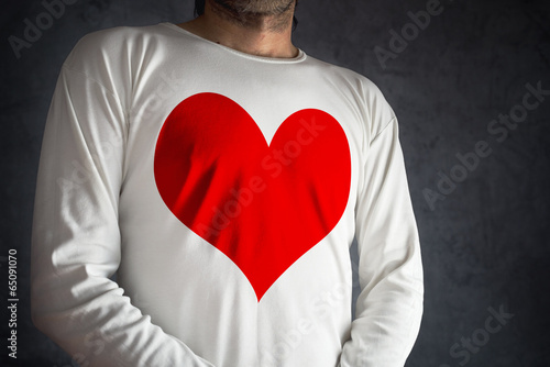 Man in white shirt with big red heart printed photo