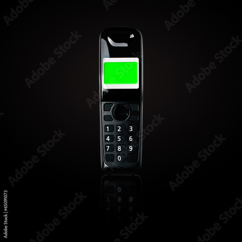 Wireless phone. Cordless phone with reflection on black gradient