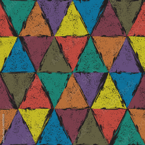 Seamless triangle grunge background. Vector