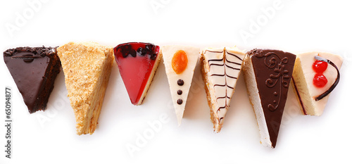 Assortment of pieces of cake, isolated on white