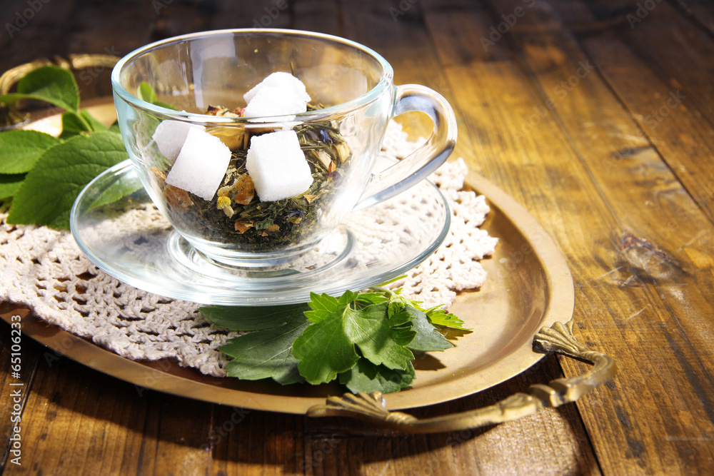 Glass cup with dry flowers and herbs, fruits ingredients for Glass cup with dry flowers and herbs, fruits ingredients for
