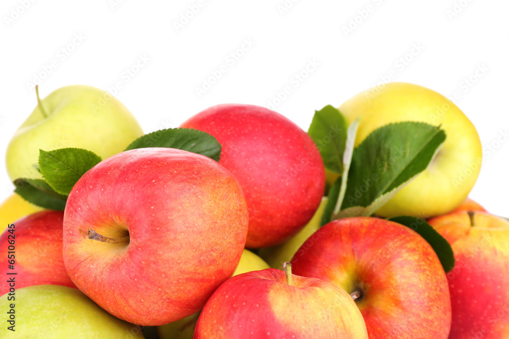 Ripe sweet apples with leaves, isolated on white Ripe sweet apples with leaves, isolated on white