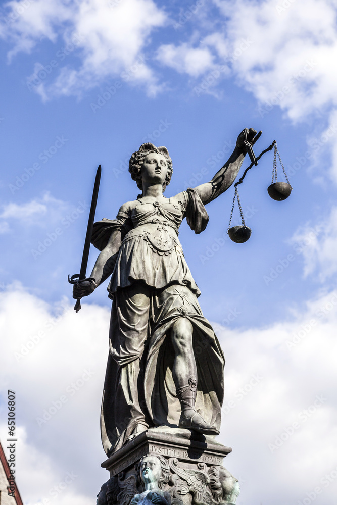 Justitia, a monument in Frankfurt, Germany Justitia, a monument in Frankfurt, Germany