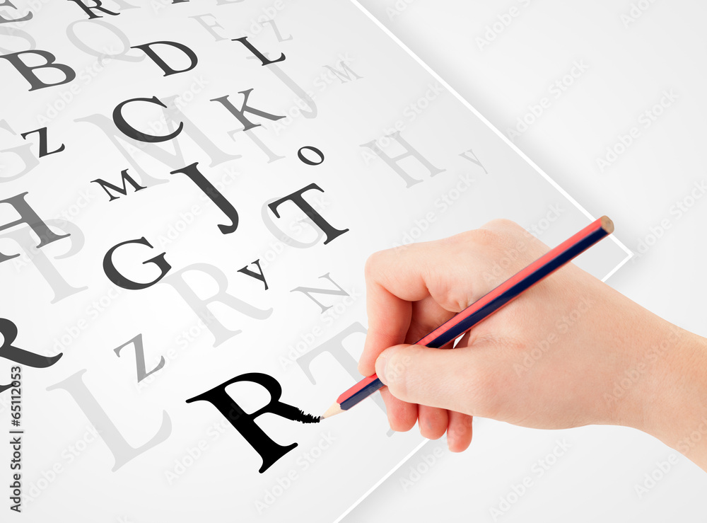 Hand writing various letters on white plain paper Hand writing various letters on white plain paper