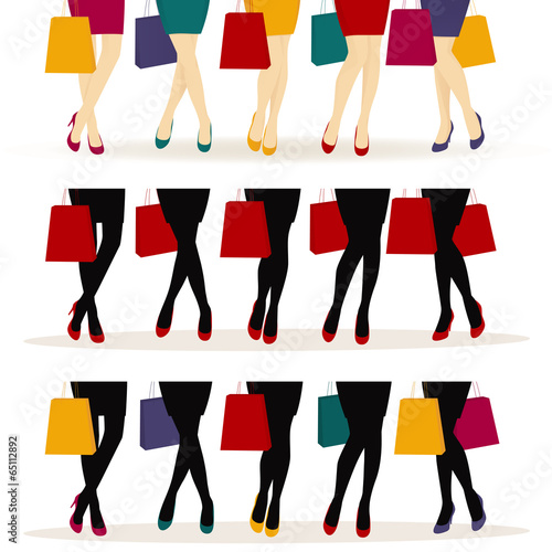 FFemale legs with colorful shoes and shopping bags