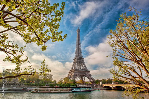 Eiffel Tower with boat on Seine in Paris, France
