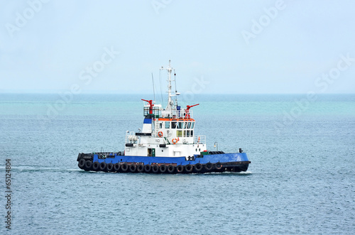 Tugboat in harbor quayside on Odessa, Ukraine