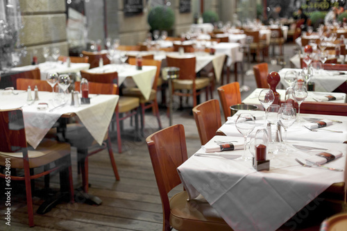 Tables at sidewalk cafe, Cancale, Ille-Et-Vilaine, Brittany, Fra